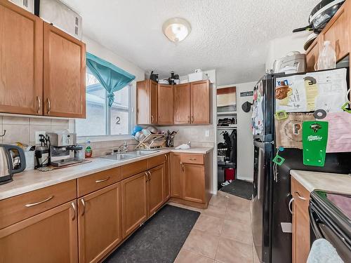 18008 91A Street, Edmonton, AB - Indoor Photo Showing Kitchen With Double Sink