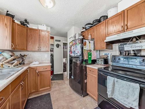 18008 91A Street, Edmonton, AB - Indoor Photo Showing Kitchen With Double Sink