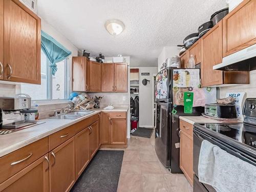 18008 91A Street, Edmonton, AB - Indoor Photo Showing Kitchen With Double Sink