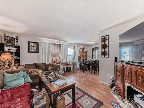 18008 91A Street, Edmonton, AB - Indoor Photo Showing Living Room With Fireplace