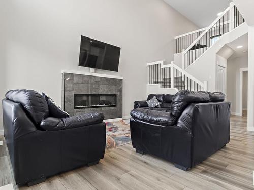 9232 222 Street, Edmonton, AB - Indoor Photo Showing Living Room With Fireplace