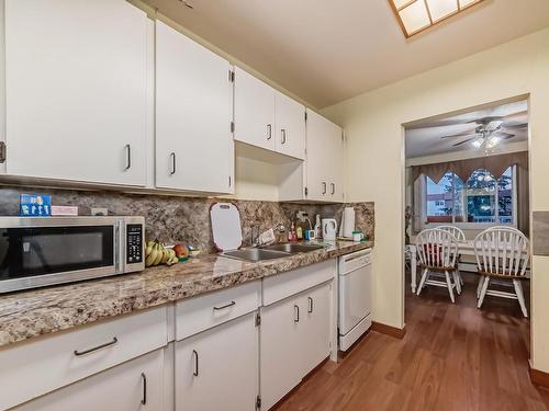 315 5125 Riverbend Road, Edmonton, AB - Indoor Photo Showing Kitchen With Double Sink