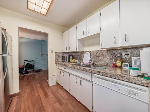 315 5125 Riverbend Road, Edmonton, AB - Indoor Photo Showing Kitchen With Double Sink