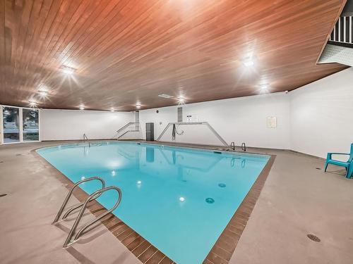 315 5125 Riverbend Road, Edmonton, AB - Indoor Photo Showing Other Room With In Ground Pool