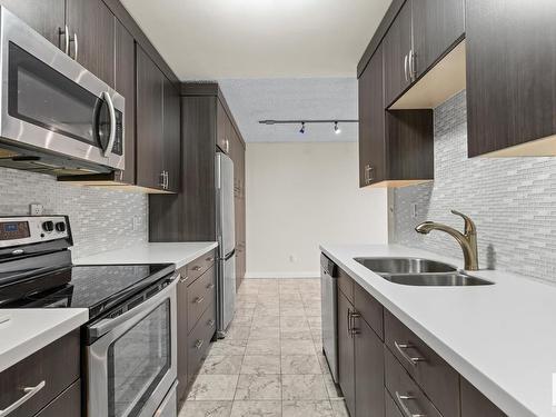 802 10125 109 Street, Edmonton, AB - Indoor Photo Showing Kitchen With Stainless Steel Kitchen With Double Sink With Upgraded Kitchen