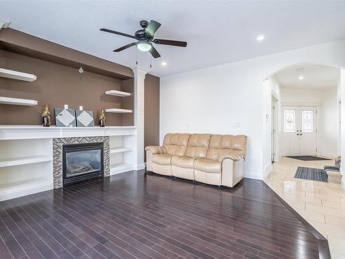 5408 30 Avenue, Beaumont, AB - Indoor Photo Showing Living Room With Fireplace