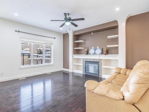 5408 30 Avenue, Beaumont, AB - Indoor Photo Showing Living Room With Fireplace