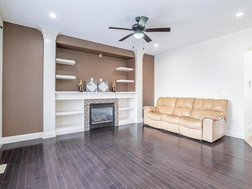 5408 30 Avenue, Beaumont, AB - Indoor Photo Showing Living Room With Fireplace