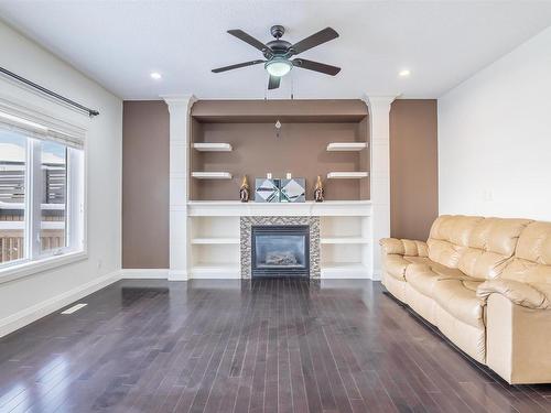 5408 30 Avenue, Beaumont, AB - Indoor Photo Showing Living Room With Fireplace