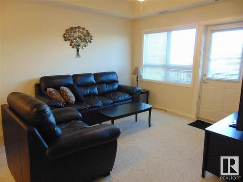 313 8702 Southfort Drive, Fort Saskatchewan, AB - Indoor Photo Showing Living Room