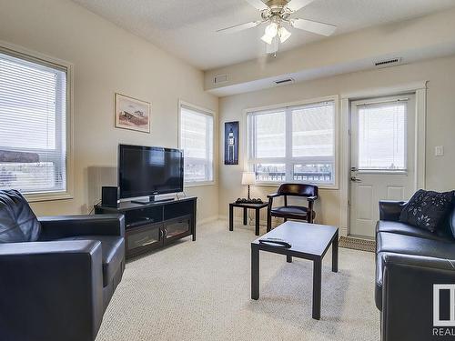 311 8702 Southfort Drive, Fort Saskatchewan, AB - Indoor Photo Showing Living Room