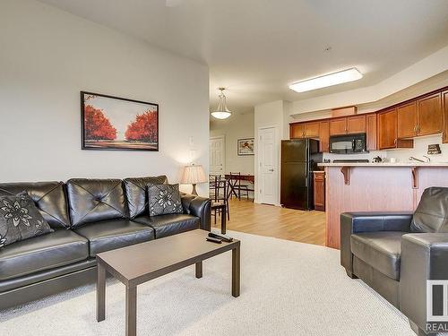 311 8702 Southfort Drive, Fort Saskatchewan, AB - Indoor Photo Showing Living Room