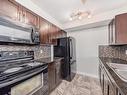 207 5370 Chappelle Road, Edmonton, AB  - Indoor Photo Showing Kitchen With Double Sink 