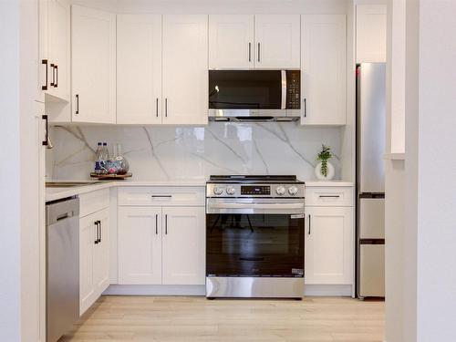 250 Callingwood Place, Edmonton, AB - Indoor Photo Showing Kitchen With Upgraded Kitchen