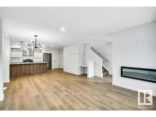 11411 88 Street, Edmonton, AB - Indoor Photo Showing Other Room With Fireplace