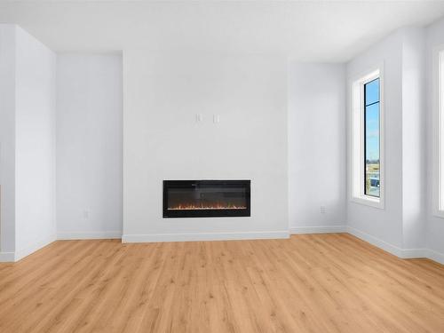 1512 Siskin Link Link, Edmonton, AB - Indoor Photo Showing Living Room With Fireplace