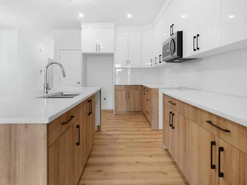 1512 Siskin Link Link, Edmonton, AB - Indoor Photo Showing Kitchen With Double Sink