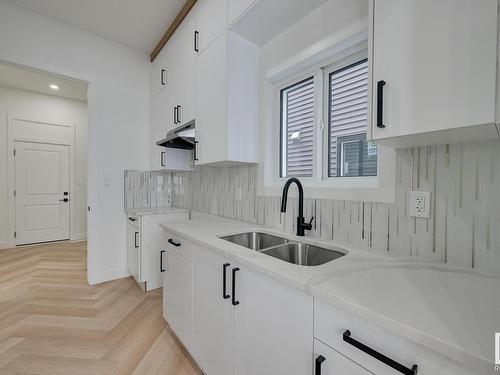 7097 Kiviaq Crescent, Edmonton, AB - Indoor Photo Showing Kitchen With Double Sink