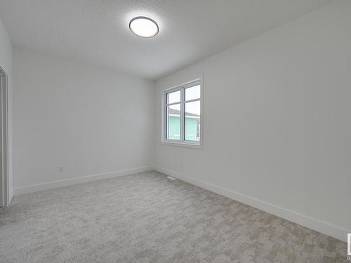 7097 Kiviaq Crescent, Edmonton, AB - Indoor Photo Showing Other Room