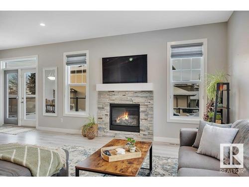 91 Rosemount Boulevard, Beaumont, AB - Indoor Photo Showing Living Room With Fireplace