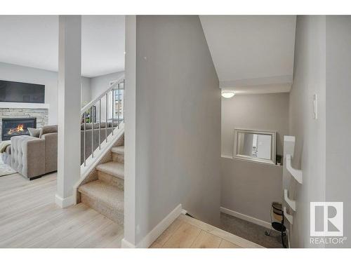 91 Rosemount Boulevard, Beaumont, AB - Indoor Photo Showing Other Room With Fireplace