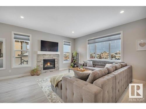 91 Rosemount Boulevard, Beaumont, AB - Indoor Photo Showing Living Room With Fireplace