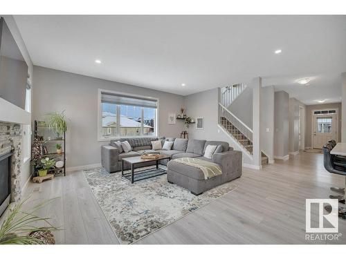 91 Rosemount Boulevard, Beaumont, AB - Indoor Photo Showing Living Room With Fireplace