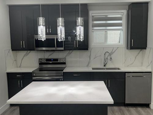 12016 104 Street, Edmonton, AB - Indoor Photo Showing Kitchen With Double Sink