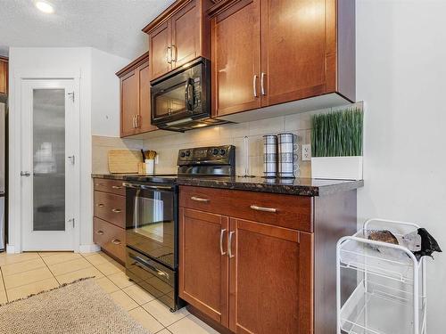 6155 11 Avenue, Edmonton, AB - Indoor Photo Showing Kitchen