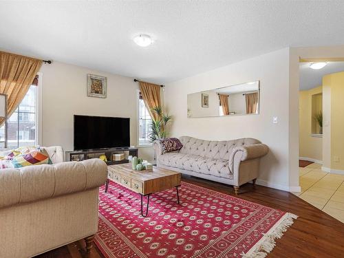 6155 11 Avenue, Edmonton, AB - Indoor Photo Showing Living Room