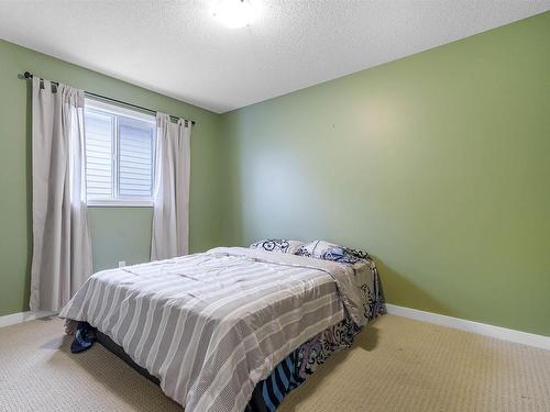 6155 11 Avenue, Edmonton, AB - Indoor Photo Showing Bedroom