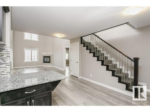 406 16235 51 Street, Edmonton, AB - Indoor Photo Showing Other Room With Fireplace