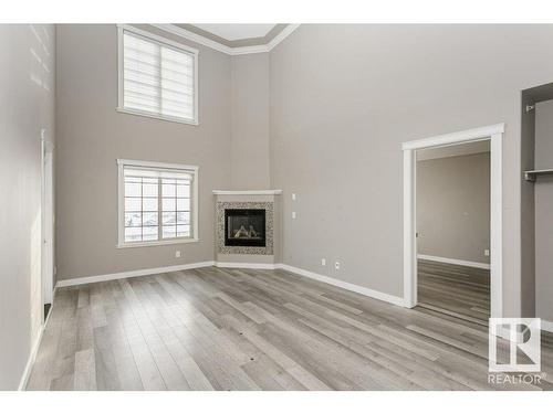 406 16235 51 Street, Edmonton, AB - Indoor Photo Showing Living Room With Fireplace