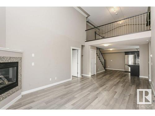 406 16235 51 Street, Edmonton, AB - Indoor With Fireplace