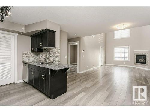 406 16235 51 Street, Edmonton, AB - Indoor With Fireplace