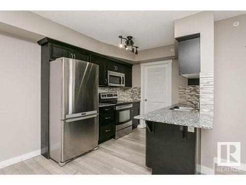 406 16235 51 Street, Edmonton, AB - Indoor Photo Showing Kitchen With Upgraded Kitchen