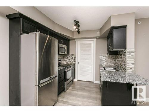 406 16235 51 Street, Edmonton, AB - Indoor Photo Showing Kitchen With Upgraded Kitchen