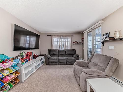 319- 11453 Ellerslie Rd Sw Road Sw, Edmonton, AB - Indoor Photo Showing Living Room