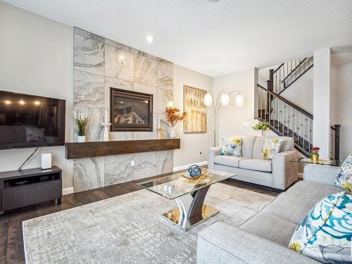 1204 Secord Landing, Edmonton, AB - Indoor Photo Showing Living Room With Fireplace