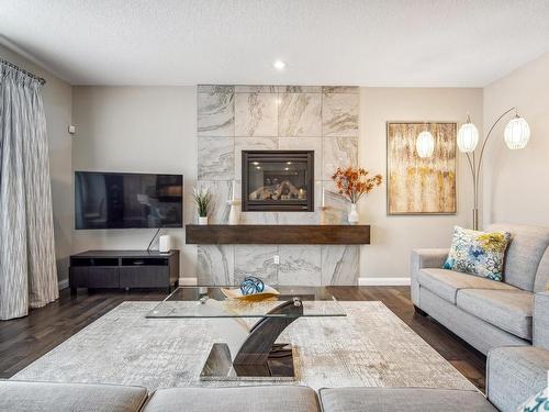 1204 Secord Landing, Edmonton, AB - Indoor Photo Showing Living Room With Fireplace