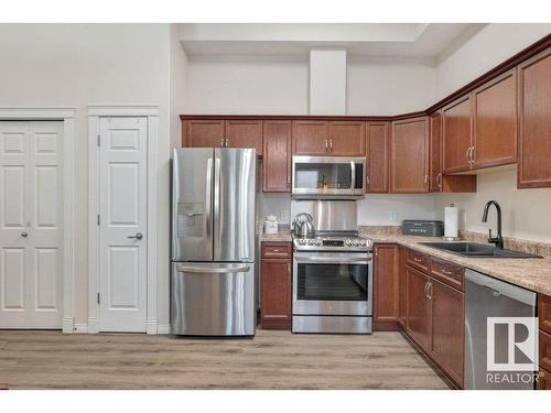 107 8702 Southfort Drive, Fort Saskatchewan, AB - Indoor Photo Showing Kitchen With Double Sink