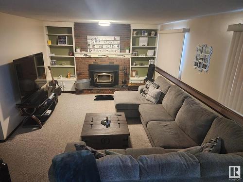 104 Hillside Court, Millet, AB - Indoor Photo Showing Living Room With Fireplace