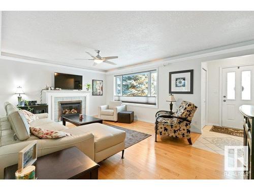 8512 71 Street, Edmonton, AB - Indoor Photo Showing Living Room With Fireplace