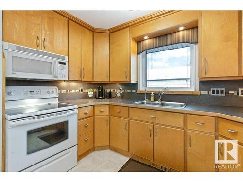 8512 71 Street, Edmonton, AB - Indoor Photo Showing Kitchen With Double Sink