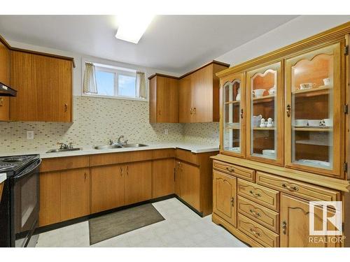 8512 71 Street, Edmonton, AB - Indoor Photo Showing Kitchen With Double Sink