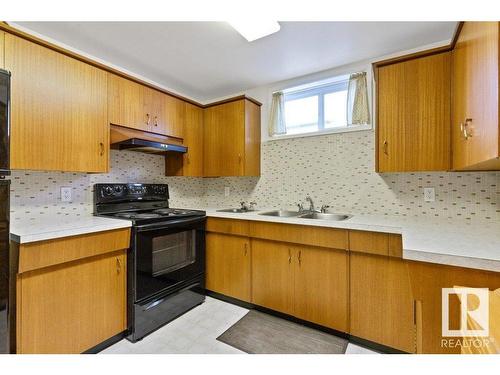 8512 71 Street, Edmonton, AB - Indoor Photo Showing Kitchen With Double Sink