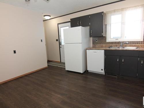 4201 73 Street, Camrose, AB - Indoor Photo Showing Kitchen With Double Sink