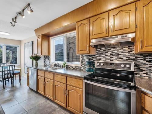 8212 Rowland Road, Edmonton, AB - Indoor Photo Showing Kitchen With Double Sink