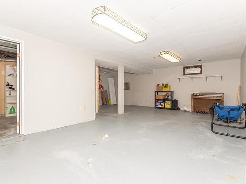 8715 27 Avenue, Edmonton, AB - Indoor Photo Showing Garage