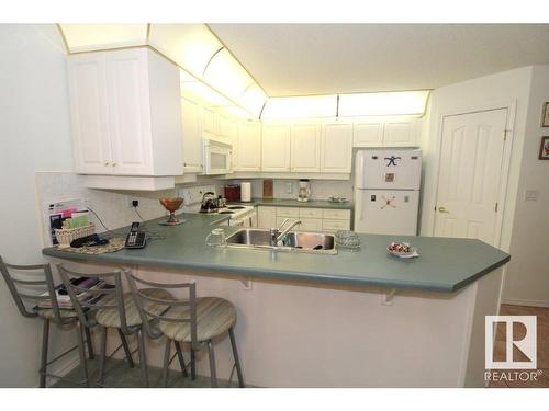 203 6703 172 Street, Edmonton, AB - Indoor Photo Showing Kitchen With Double Sink